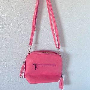 Woman’s pink shoulder handbag